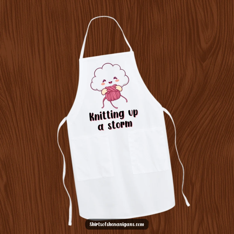 Funny Apron: Cheerful cloud knitting a rainbow, a humorous and practical kitchen accessory.