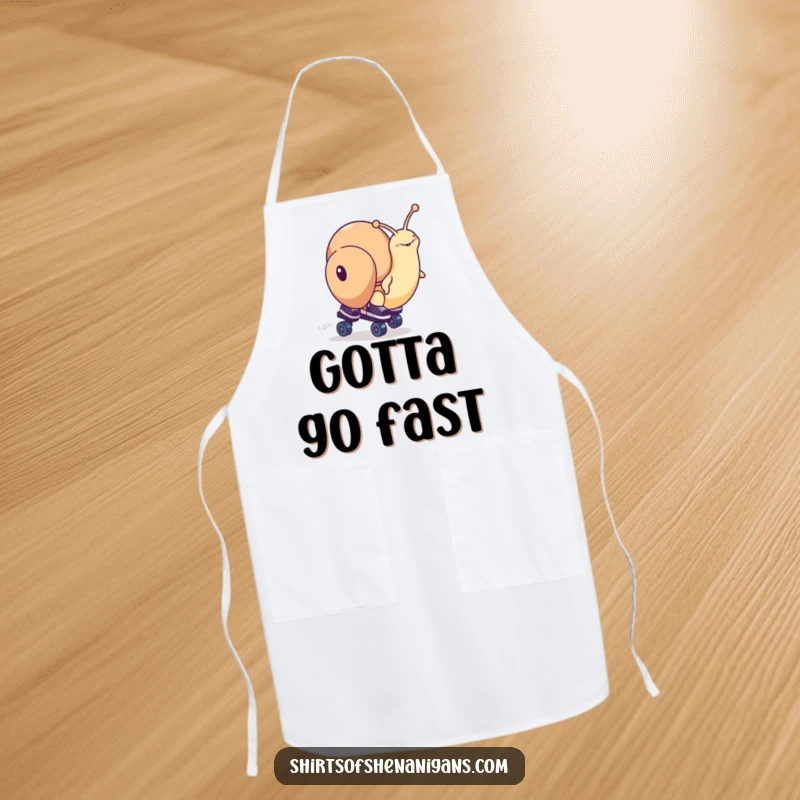 Funny snail character wearing roller skates, depicted in a high-speed race scenario, on a functional apron for kitchen humor.
