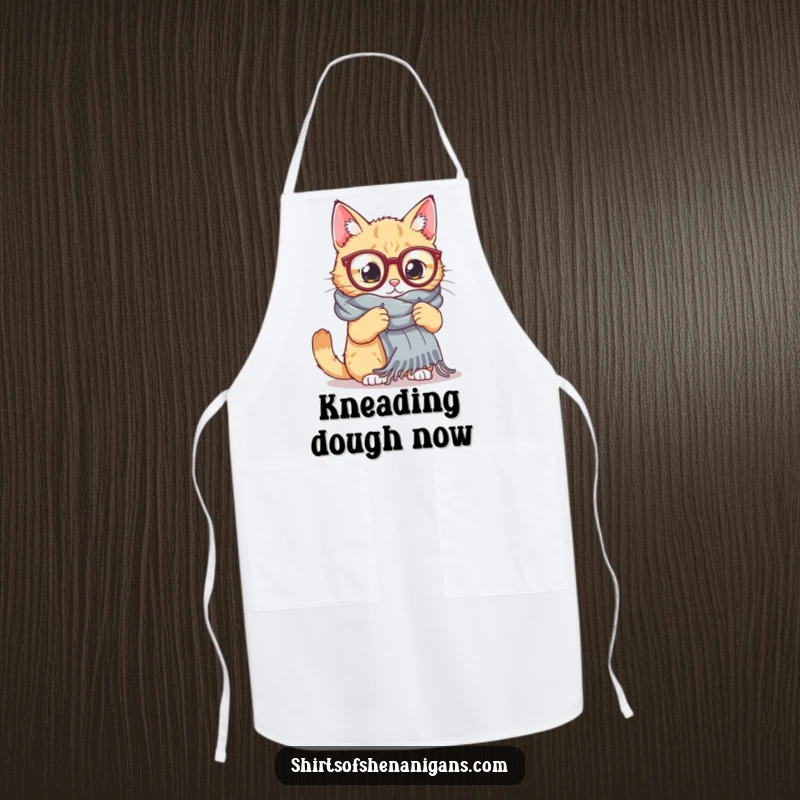 Funny Cat Knitting Apron: A cat in large glasses attempts to knit a massive scarf, a fun and practical kitchen accessory.