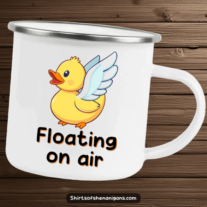Funny rubber duck with determined flapping wings, attempting to soar, on a durable camping mug.