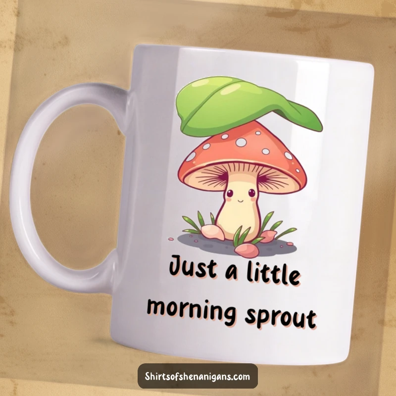 Funny mushroom peeking shyly from under a large leaf on a ceramic mug, perfect for nature lovers.