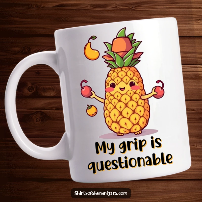 Funny mug featuring a stressed juggling pineapple in a tiny hat dropping all its fruit with a look of comic despair.
