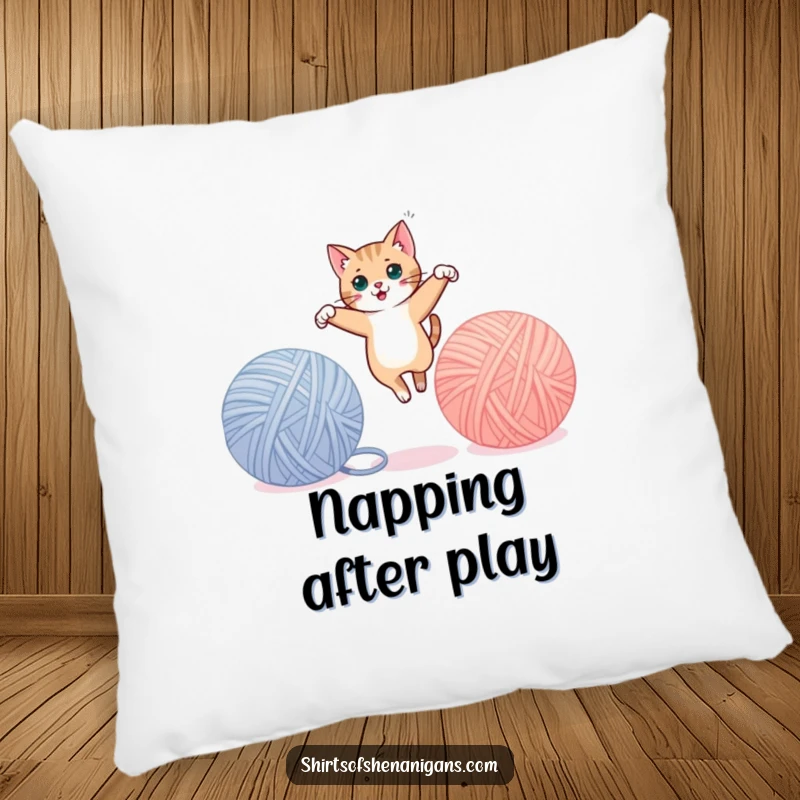 Funny cat pillow, mid-leap between large yarn balls, offering cozy comfort and feline playfulness. An adorable funny gift.