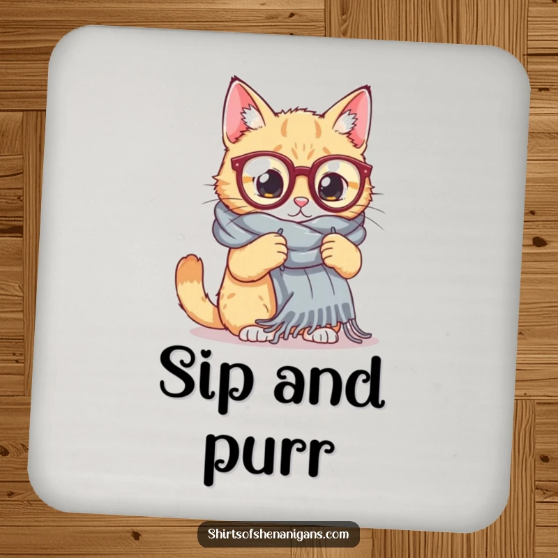 Funny Cat Knitting Drink Coaster: A cat wearing oversized glasses attempts to knit a giant scarf, offering stylish and funny surface protection.