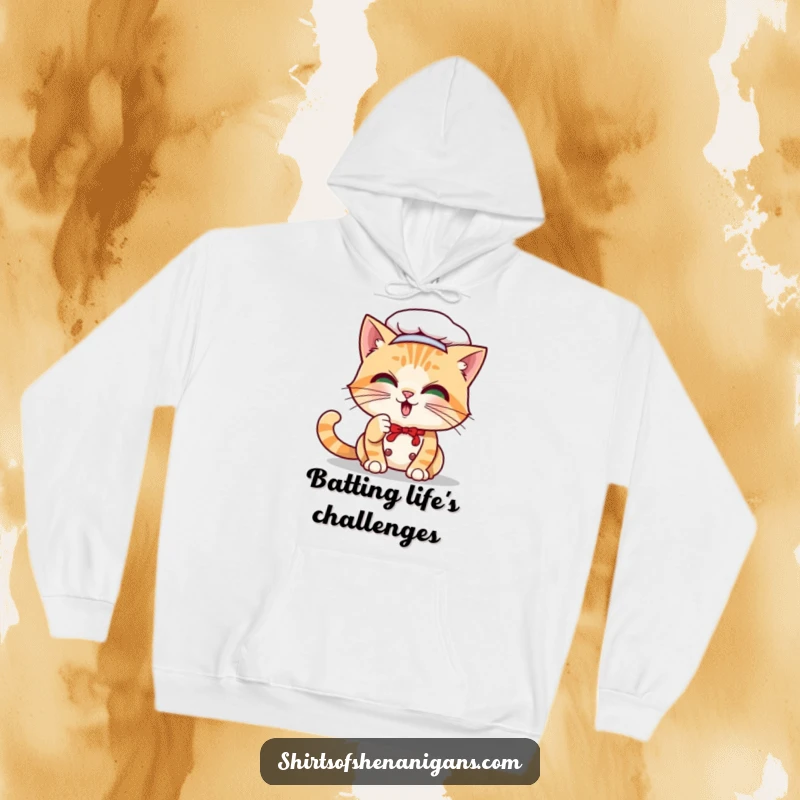 Funny Cat Chef Hoodie: A playful cat character batting a whisker, designed for warmth and humor.