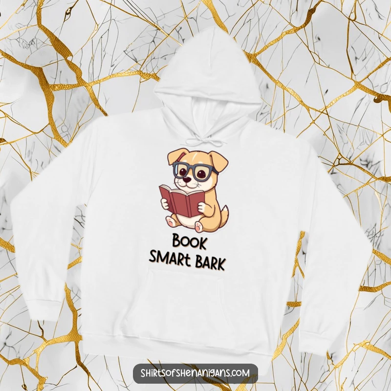 Funny hoodie featuring a dog wearing glasses, engrossed in a dramatic reading of a tiny book.