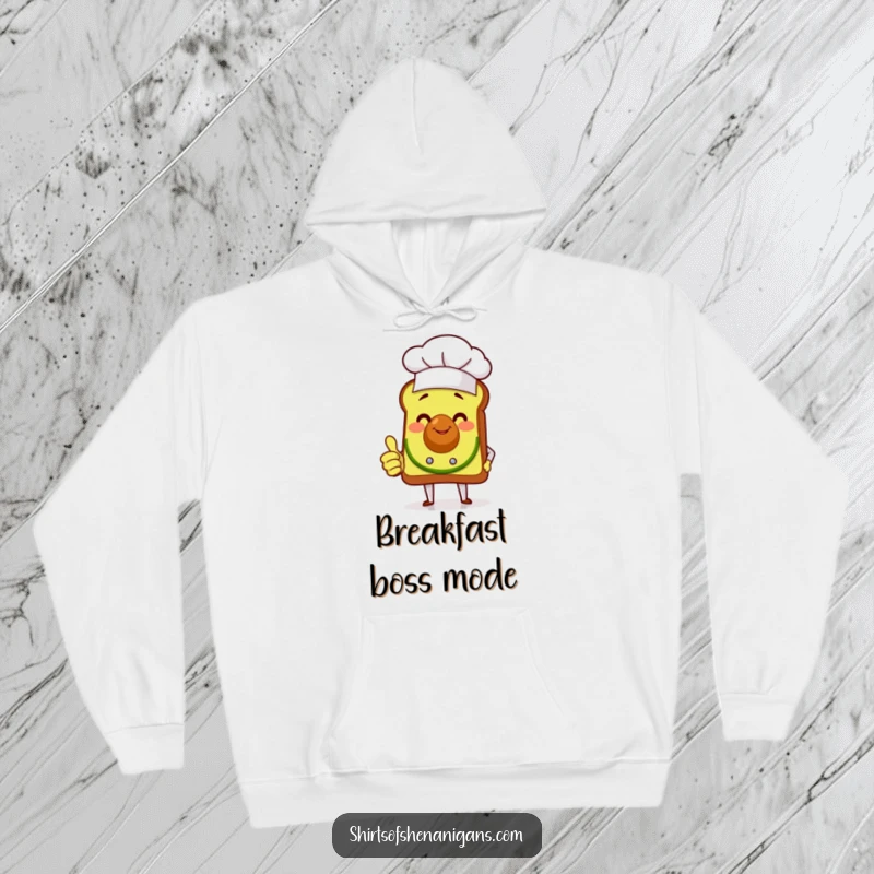 Funny smiling avocado toast chef giving a thumbs up, printed on a soft, warm hoodie for ultimate comfort and humor.