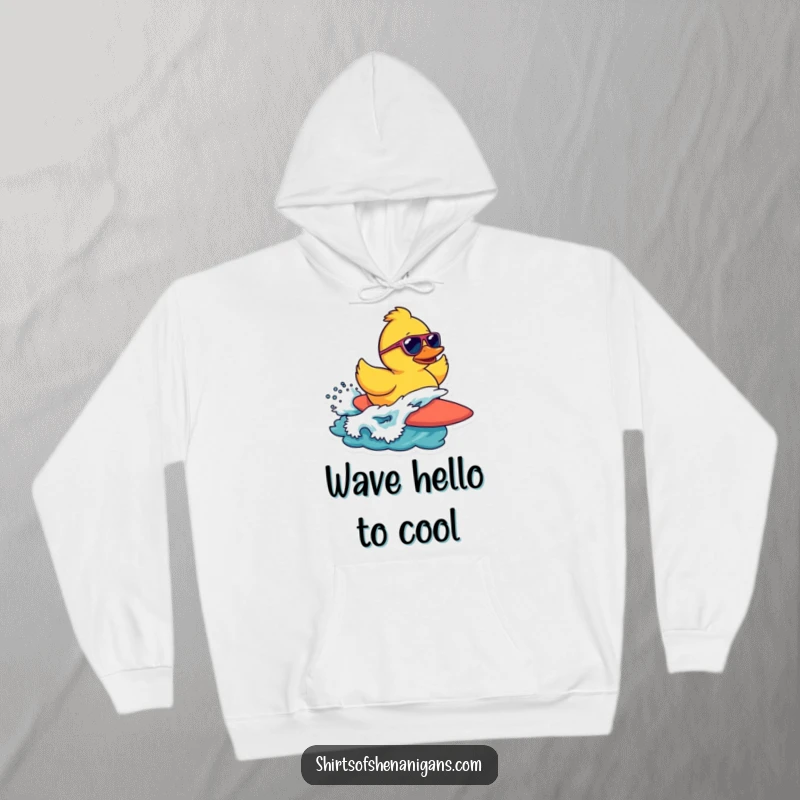 Funny hoodie featuring a rubber duck in sunglasses, stylishly surfing a wave, exuding ultimate cool.
