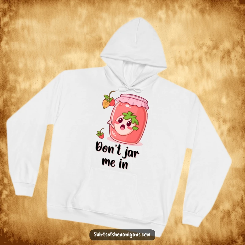 Funny Hoodie: Surprised strawberry escaping a jam jar, a cozy and humorous piece of clothing.