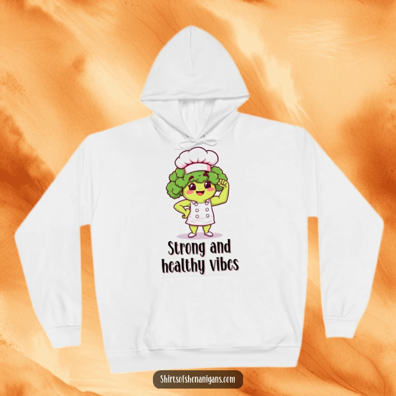 Funny Broccoli Chef Hoodie: A proud broccoli character flexing a muscle, designed for warmth and motivation.