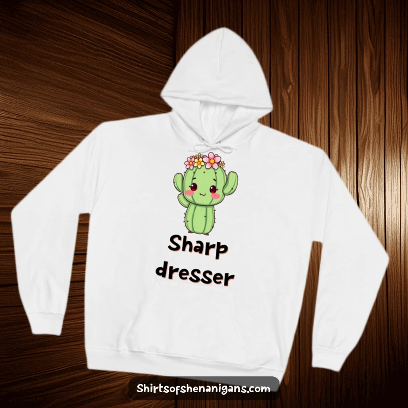 Funny cactus hoodie depicting a proud cactus in a flower crown, caught in an awkward pose, ideal for warm and humorous wear.