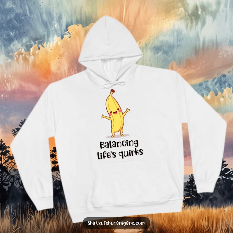 Funny hoodie featuring a happy banana performing a handstand, exuding joy and athleticism.