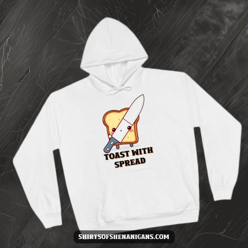 Funny shy toast hoodie, peeking adorably from behind a large butter knife, offering cozy breakfast charm.