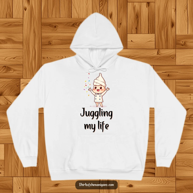 Funny ice cream cone chef hoodie featuring a happy character juggling sprinkles, perfect for cozy dessert lovers.