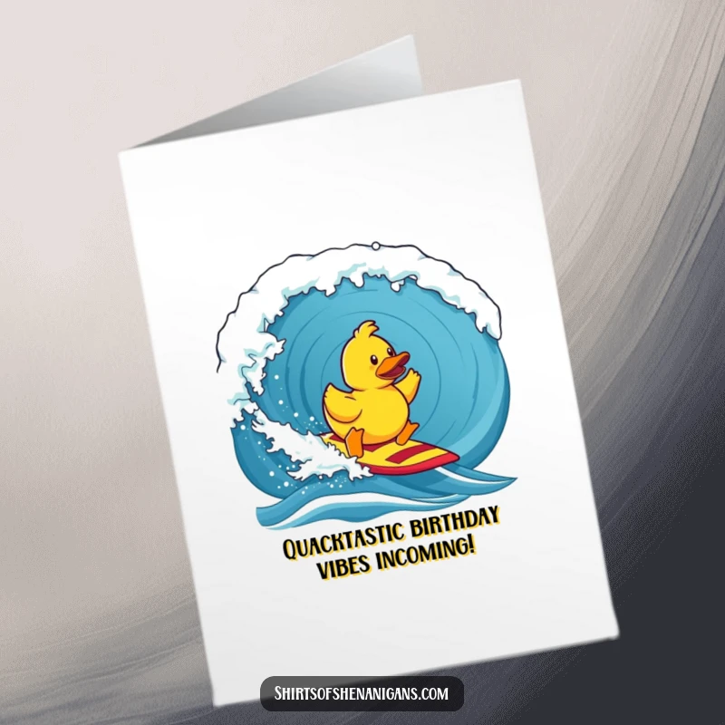 Funny free printable birthday card featuring a determined rubber duck bravely surfing a massive, epic wave with cartoon splash effects.