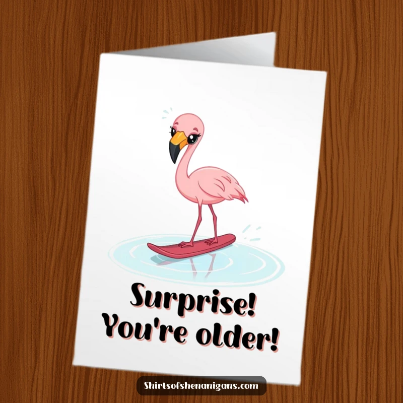 Funny Free Printable Birthday Card: Startled flamingo cross-eyed water skiing on a puddle, perfect for a laugh, DIY.