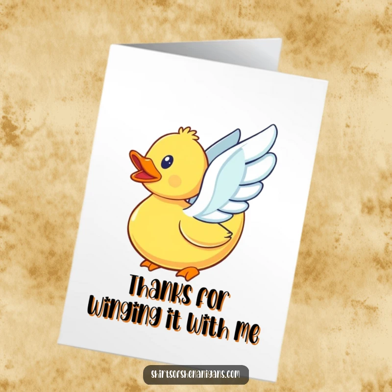 Funny Free Printable Thank You Card: A rubber duck comically flapping tiny wings, ascending in a humorous display of thanks.
