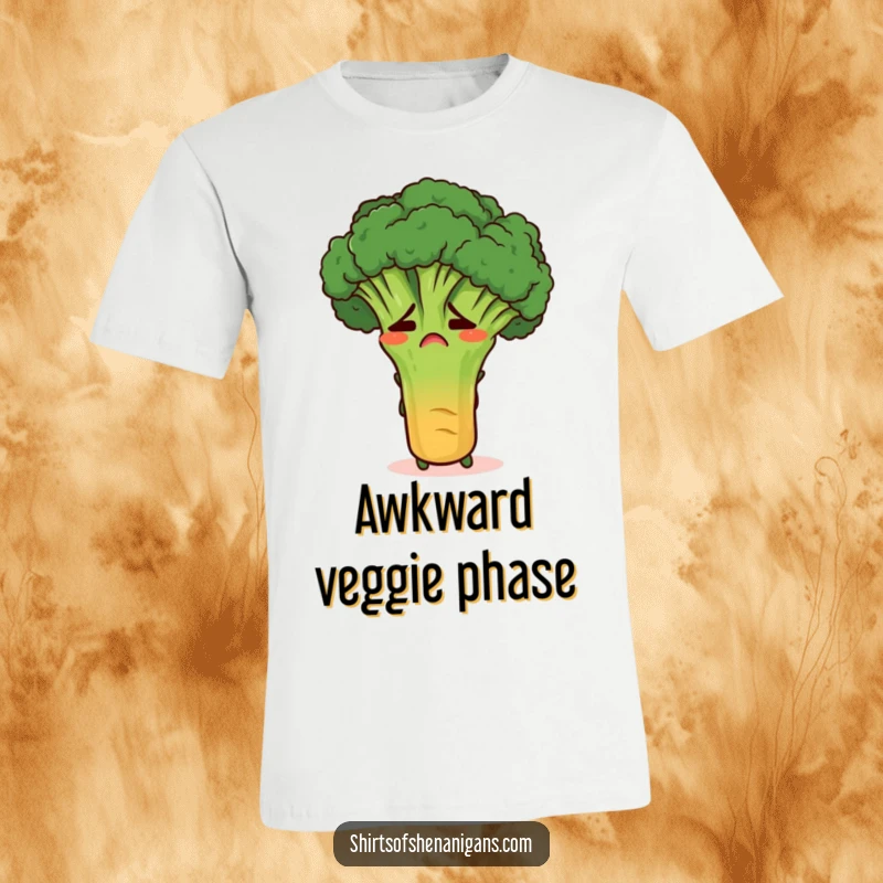 Funny embarrassed broccoli hiding behind a carrot on a t-shirt, representing relatable veggie shyness and humor.