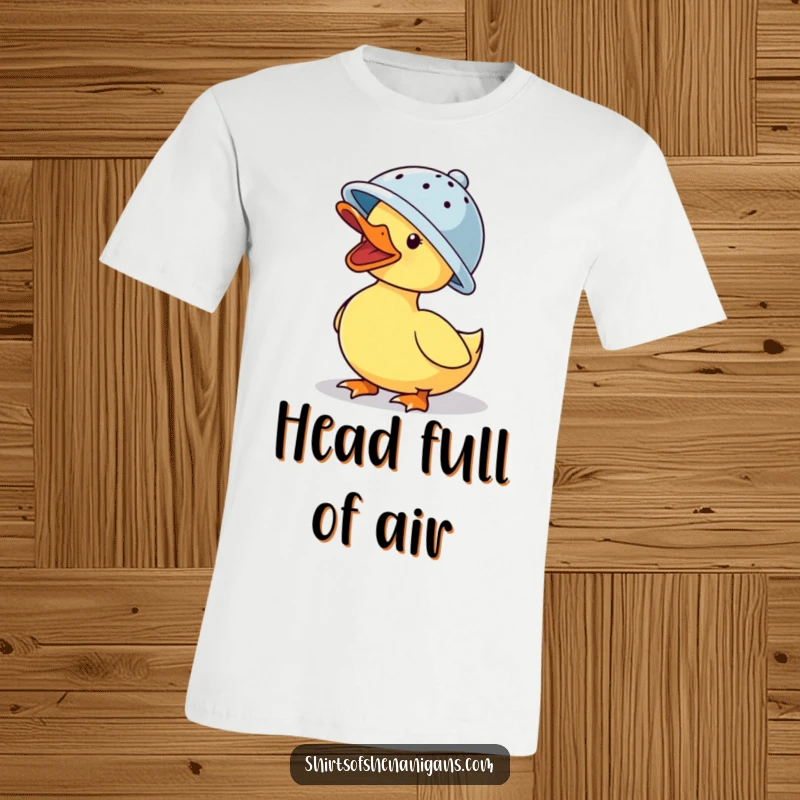 Funny t-shirt: A comical duck wearing a colander hat while quacking heartily, a symbol of playful absurdity.