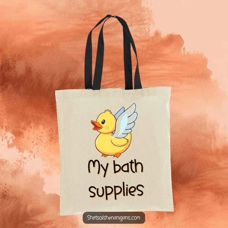Funny rubber duck with inadequate wings, trying to achieve flight, on a durable tote bag.