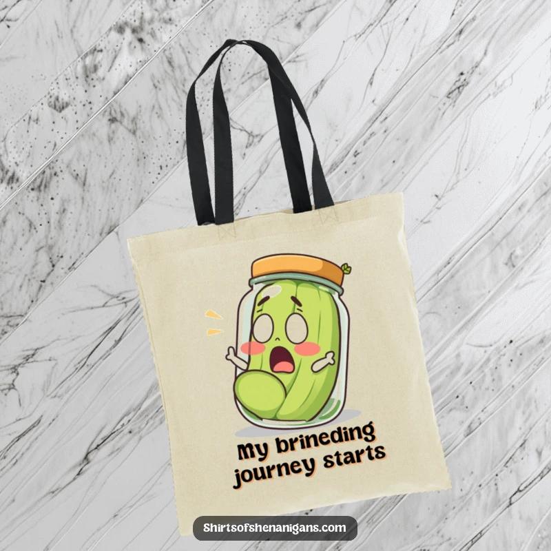 Funny shocked pickle making a surprised escape from a pickle jar, printed on a durable tote bag.