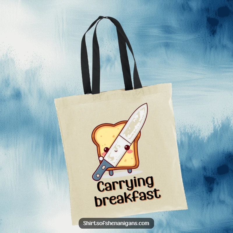 Funny shy toast tote bag, peeking from behind a giant butter knife, for carrying breakfast essentials with charm.